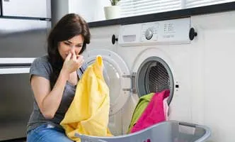 Bad smell, detergent not rinsing properly